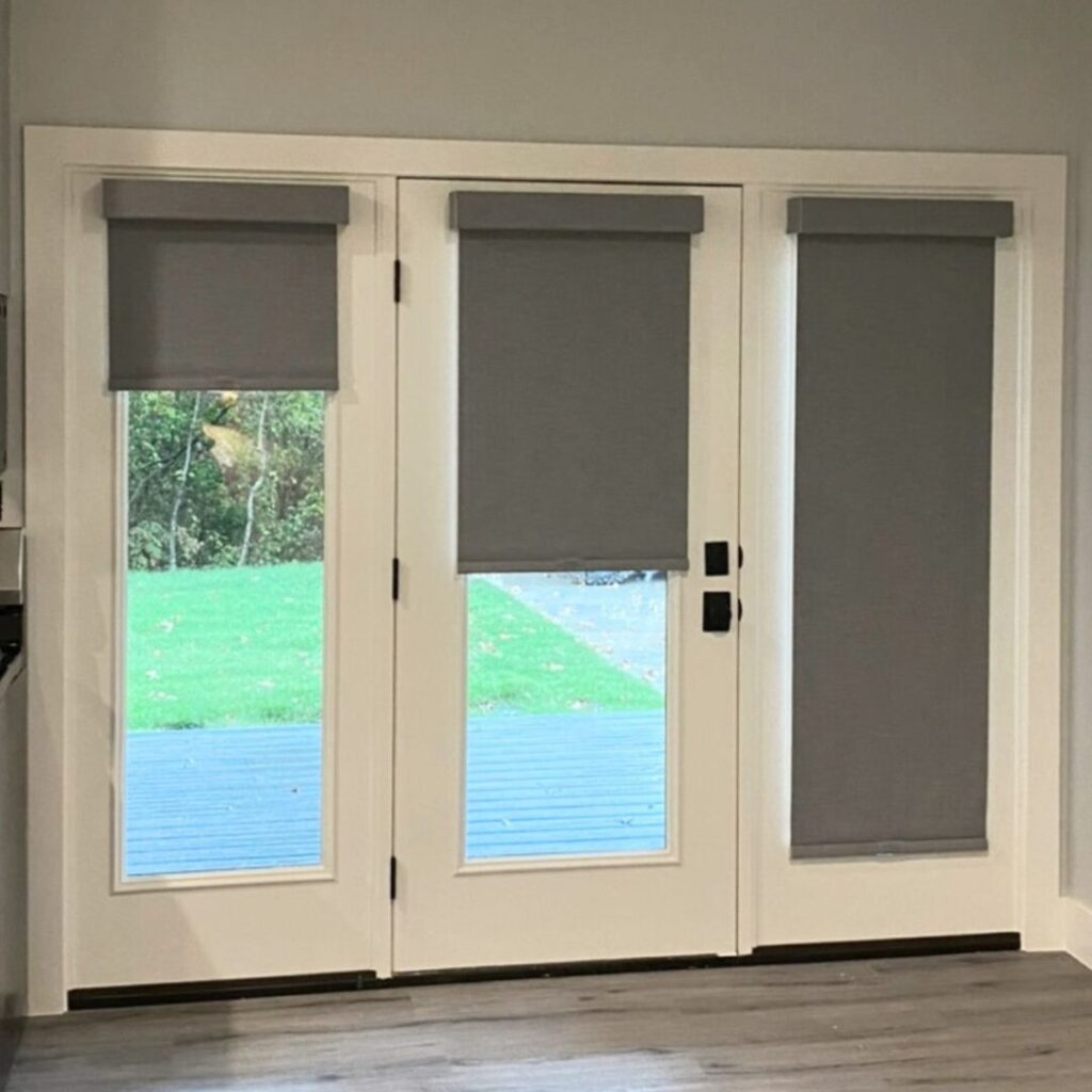 roller-shades-various-heights-french-door